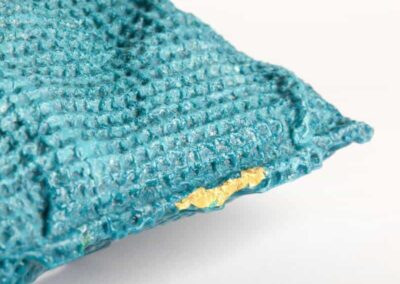 Blue textured glass and gold sculpture
