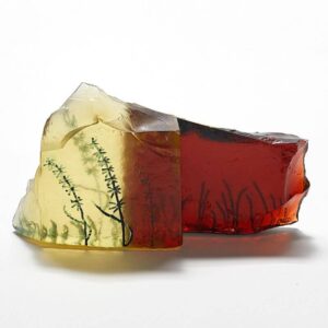 Handmade glass sculpture in red and yellow with engraving