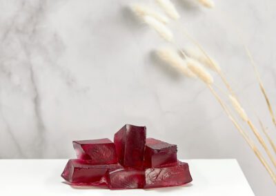 Pink glass sculpture in a room setting