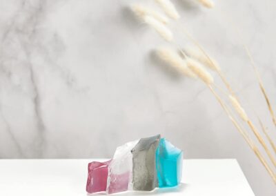 Elegant glass sculpture with colourful geometric shapes for modern interior decor.