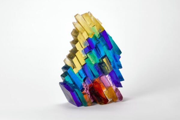 Handmade Art Glass Sculpture inspired by sunshine through water lighting up the rocks below by International Glass Maker Deborah Timperley