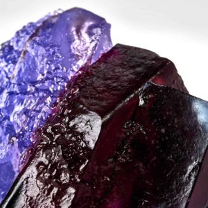 Rocky outcrop surrounded by purple heathers. Landscape glass sculpture by Deborah Timperley.